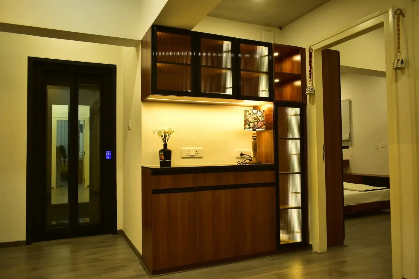 Backlit bar unit with fluted glass