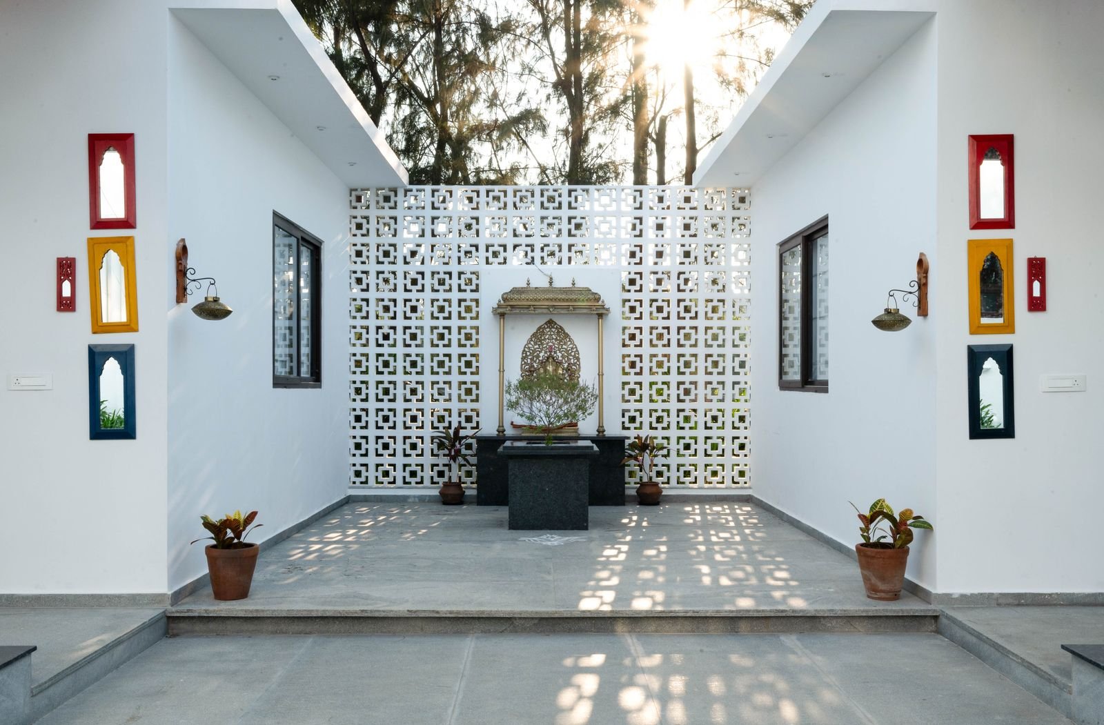 Courtyard with jaali wall and shrine